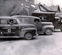 Archival image of Red Cross blood transfusion service vehicles