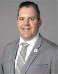 A headshot of Scott Osmachenko.