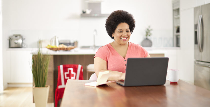 A woman working on laptop