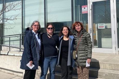 A group of Tiffany Circle members stand outside the Anne Marie D’Amico community collective centre in North York, Ontario.