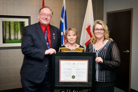 Florence Barron being presented the Order of the Red Cross