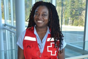A headshot of Modeline Longjohn wearing a Canadian Red Cross vest.