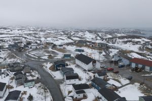 An aerial landscape of a coastal community in Newfoundland and Labrador, taken by a drone.