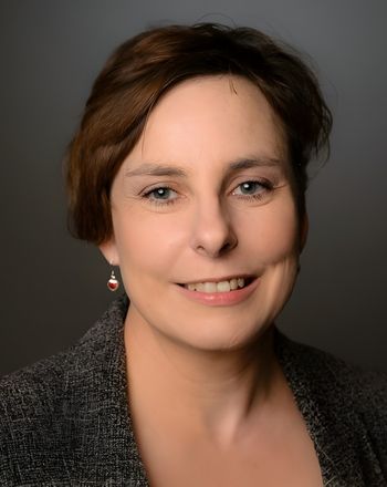 A headshot of Sheila Rogers.