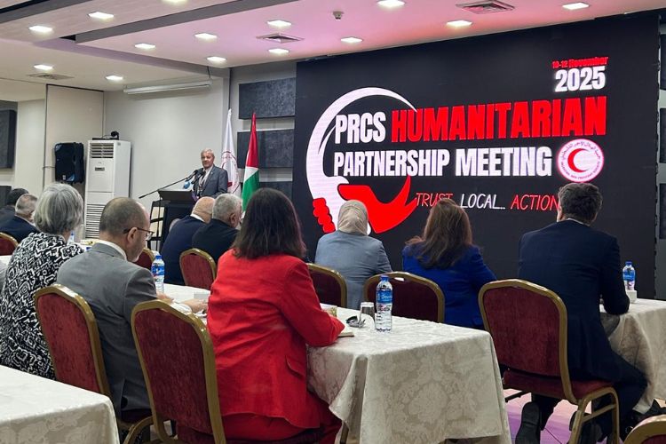 ersonnes participant à la rencontre de partenariat humanitaire de 2025 de la SCRP dans une salle de conférence.