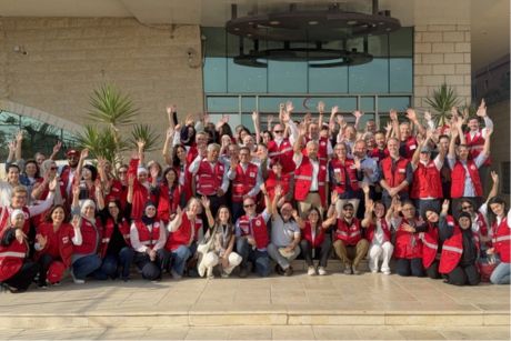 A group photo from the Palestine Red Crescent Society partnership meeting.