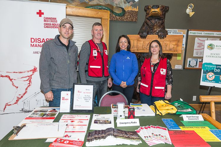Canadian Red Cross personnel at an information booth.