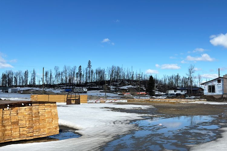 Stacks of wood and construction materials in Denare Beach, Saskatchewan.
