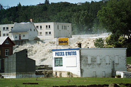 The famous “Little White House” of Chicoutimi, photographed at the height of the Saguenay Flood in July 1996.