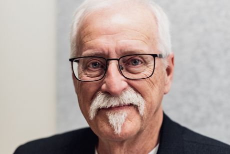 A headshot of Denis Desilets