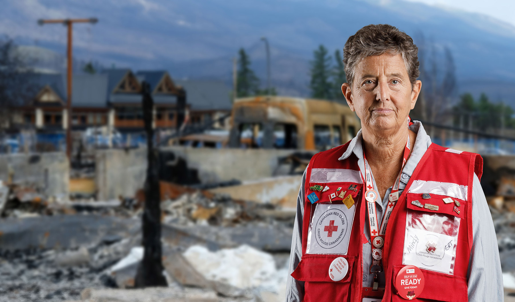 A Red Cross volunteer stands ready to help in Jasper, Alberta. 