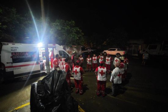 Red Cross volunteers pack food kits enabled by the National Society in Mexico City
