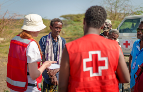 Community members photographed with local society members in Ethiopia.