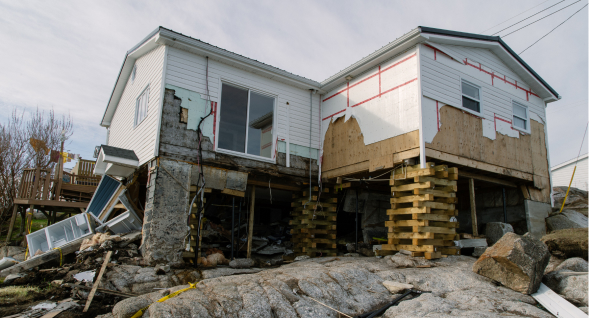 house impacted by Hurricane Fiona