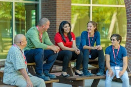 Red Cross trainer and four adult students